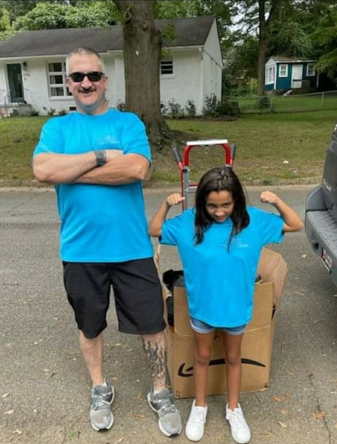 Erik, founder of Smooth Moves, with his daughter on a moving day